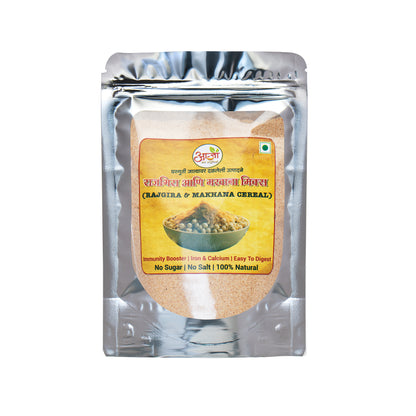 A silver pouch of Rajgira & Makhana Mix features a label with a bowl of this protein-rich breakfast, highlighting benefits like no sugar, no salt, 100% natural ingredients, iron, calcium, and easy digestion.