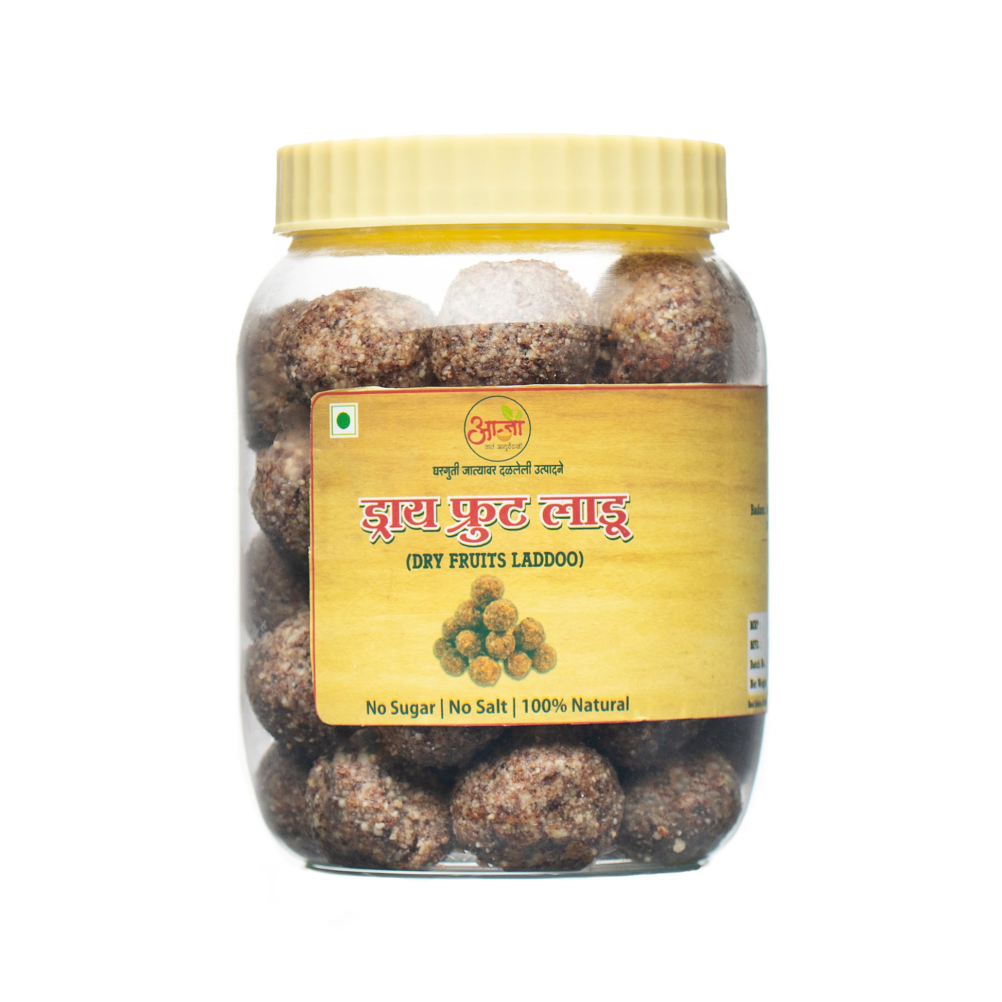 A transparent jar with a yellow lid contains brown, round Dry Fruit Laddoo. The label states "Dry Fruit Laddoo," highlighting No Sugar, No Salt, and 100% Natural—ideal for baby nutrition and healthy snacks. Set against a white background. -  Dry Fruit Laddoo - My Store